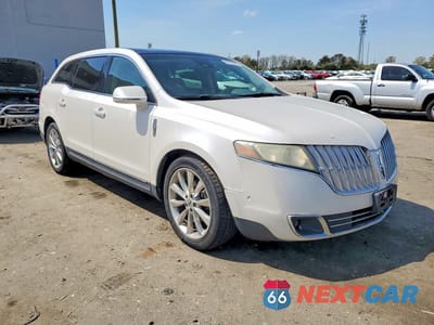 Czwarte zdjęcie samochodu z boku: 2011 LINCOLN MKT VIN:2LMHJ5ATXBBJ54769 - miniatura