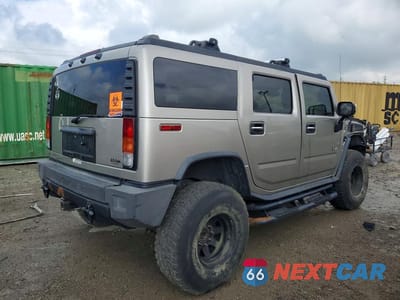 Trzecie zdjęcie samochodu z tyłu: 2004 HUMMER H2 VIN:5GRGN23U64H111278 - miniatura