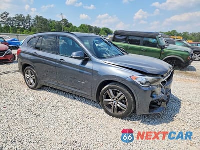 Czwarte zdjęcie samochodu z boku: 2018 BMW X1 XDRIVE28I VIN:WBXHT3C32J5F93131 - miniatura