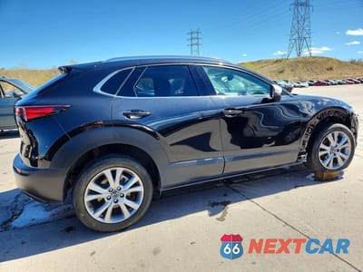 Trzecie zdjęcie samochodu z tyłu: 2023 MAZDA CX-30 PREMIUM VIN:3MVDMBDMXPM527581 - miniatura