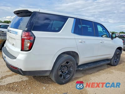 Trzecie zdjęcie samochodu z tyłu: 2022 CHEVROLET TAHOE C1500 VIN:1GNSCLEDXNR247372 - miniatura