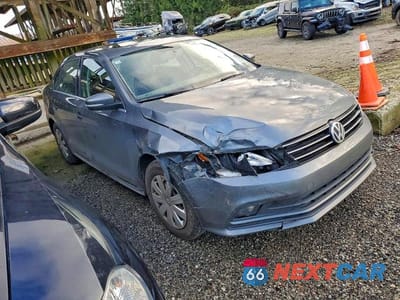 Czwarte zdjęcie samochodu z boku: 2015 VOLKSWAGEN JETTA SE VIN:3VWD07AJ4FM341597 - miniatura