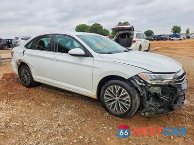 Czwarte zdjęcie samochodu z boku: 2021 VOLKSWAGEN JETTA S VIN:3VWC57BU7MM013268 - miniatura