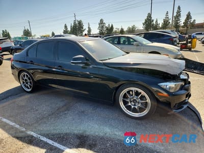 Czwarte zdjęcie samochodu z boku: 2015 BMW 320 I VIN:WBA3B1G55FNT06411 - miniatura