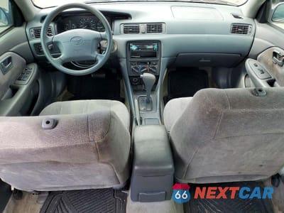 Zdjęcie 8 z 12 samochodu: 1999 TOYOTA CAMRY LE VIN:4T1BG22KXXU548214 - miniatura