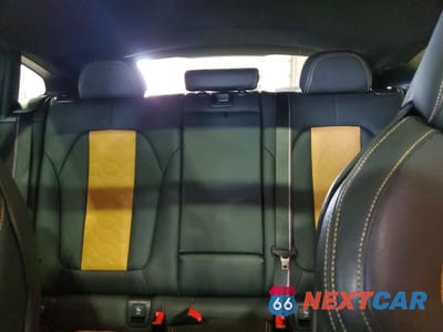 Zdjęcie 10 z 13 samochodu: 2024 BMW X4 M VIN:5YM23EC09R9T64944 - miniatura