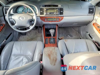 Zdjęcie 8 z 12 samochodu: 2002 TOYOTA CAMRY XLE V6 VIN:JTDBF30K720001725 - miniatura