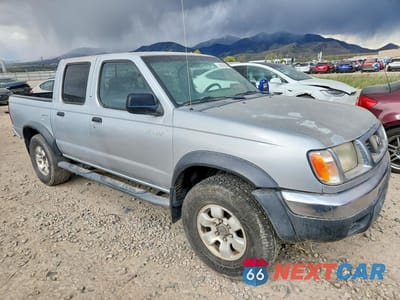 Czwarte zdjęcie samochodu z boku: 2000 NISSAN FRONTIER XE VIN:1N6ED27T3YC354060 - miniatura