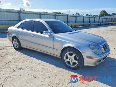 Czwarte zdjęcie samochodu z boku: 2003 MERCEDES-BENZ E 320 VIN:WDBUF65J43A128291 - miniatura