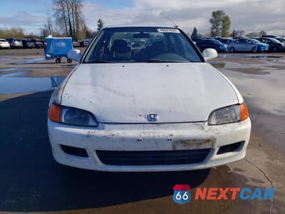 Piąte zdjęcie samochodu w środku: 1992 HONDA CIVIC DX VIN:JHMEG854XNS028331 - miniatura