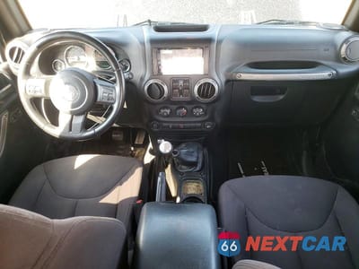 Zdjęcie 8 z 13 samochodu: 2015 JEEP WRANGLER UNLIMITED SPORT VIN:1C4BJWDG9FL657449 - miniatura