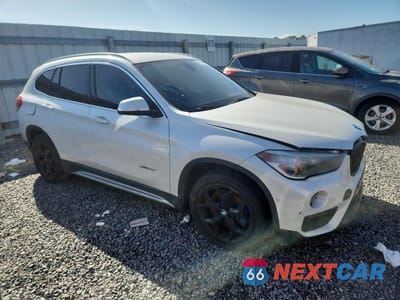Czwarte zdjęcie samochodu z boku: 2017 BMW X1 SDRIVE28I VIN:WBXHU7C35H5H33719 - miniatura