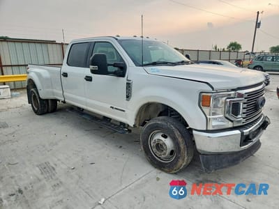 Czwarte zdjęcie samochodu z boku: 2021 FORD F350 SUPER DUTY VIN:1FT8W3DT0MED43195 - miniatura