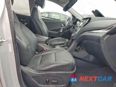 Zdjęcie 7 z 13 samochodu: 2013 HYUNDAI SANTA FE SPORT 2.0T VIN:5XYZUDLA2DG084720 - miniatura