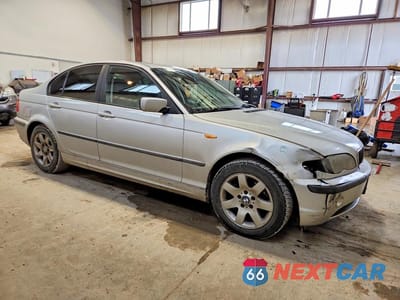 Czwarte zdjęcie samochodu z boku: 2002 BMW 320 I VIN:WBAEV13452KL20236 - miniatura