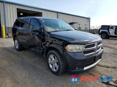 Czwarte zdjęcie samochodu z boku: 2013 DODGE DURANGO SXT VIN:1C4RDJAG7DC670856 - miniatura