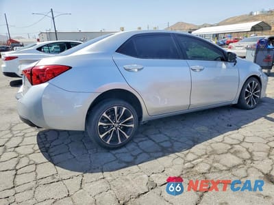 Trzecie zdjęcie samochodu z tyłu: 2017 TOYOTA COROLLA SE VIN:5YFBURHE6HP615350 - miniatura