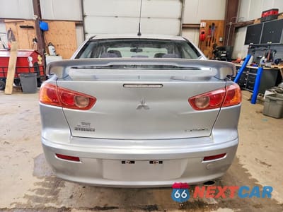 Zdjęcie 6 z 13 samochodu: 2009 MITSUBISHI LANCER ES 4DR VIN:JA3AU26U39U608808 - miniatura