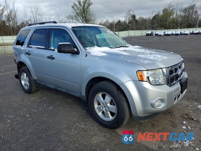 Czwarte zdjęcie samochodu z boku: 2011 FORD ESCAPE XLT VIN:1FMCU0DG9BKA73301 - miniatura