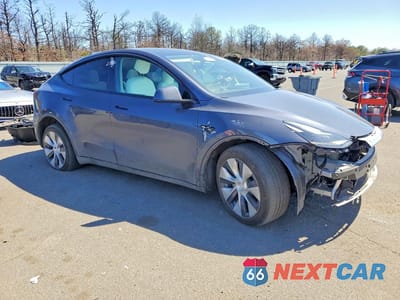Czwarte zdjęcie samochodu z boku: 2023 TESLA MODEL Y VIN:7SAYGDEE1PF747454 - miniatura
