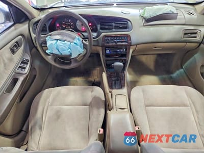 Zdjęcie 8 z 12 samochodu: 1999 NISSAN ALTIMA XE VIN:1N4DL01D5XC266445 - miniatura