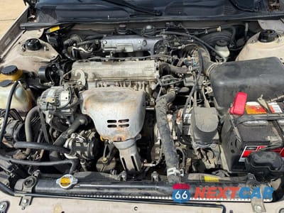 Zdjęcie 7 z 12 samochodu: 1999 TOYOTA CAMRY LE VIN:4T1BG22KXXU896076 - miniatura