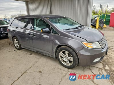 Czwarte zdjęcie samochodu z boku: 2012 HONDA ODYSSEY TOURING VIN:5FNRL5H9XCB120795 - miniatura
