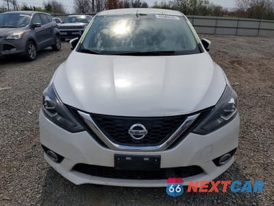 Piąte zdjęcie samochodu w środku: 2019 NISSAN SENTRA SR VIN:3N1AB7AP4KY219204 - miniatura