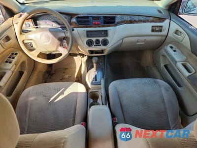 Zdjęcie 8 z 12 samochodu: 2002 MITSUBISHI LANCER ES VIN:JA3AJ26E42U062138 - miniatura