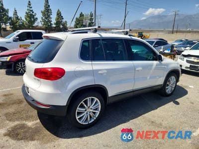 Trzecie zdjęcie samochodu z tyłu: 2014 VOLKSWAGEN TIGUAN S VIN:WVGAV3AX4EW550496 - miniatura