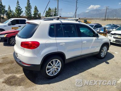 Trzecie zdjęcie samochodu z tyłu: 2014 VOLKSWAGEN TIGUAN S VIN:WVGAV3AX4EW550496 - miniatura