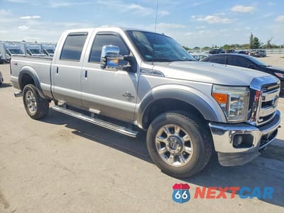 Czwarte zdjęcie samochodu z boku: 2012 FORD F250 SUPER DUTY VIN:1FT7W2BT8CEA99674 - miniatura