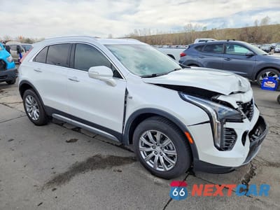 Czwarte zdjęcie samochodu z boku: 2022 CADILLAC XT4 PREMIUM LUXURY VIN:1GYFZDR49NF100593 - miniatura
