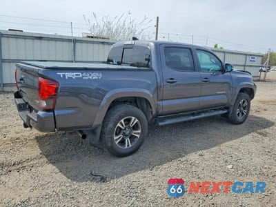 Trzecie zdjęcie samochodu z tyłu: 2019 TOYOTA TACOMA TRD SPORT VIN:3TMCZ5AN2KM279753 - miniatura