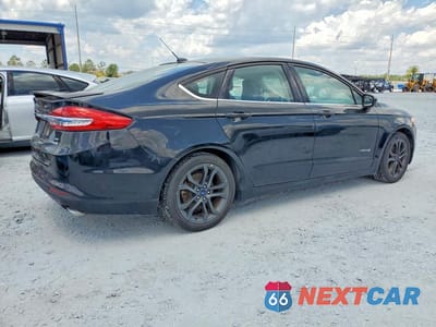 Trzecie zdjęcie samochodu z tyłu: 2018 FORD FUSION SE HYBRID VIN:3FA6P0LU9JR123999 - miniatura