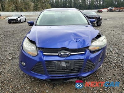 Piąte zdjęcie samochodu w środku: 2014 FORD FOCUS TITANIUM VIN:1FADP3J20EL230468 - miniatura