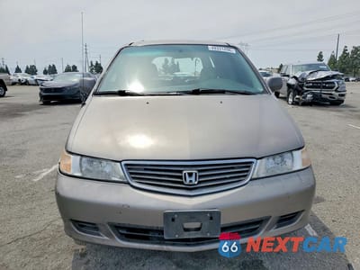Piąte zdjęcie samochodu w środku: 2000 HONDA ODYSSEY EX VIN:2HKRL1867YH524001 - miniatura