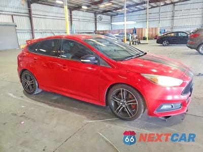 Czwarte zdjęcie samochodu z boku: 2016 FORD FOCUS ST VIN:1FADP3L96GL397320 - miniatura
