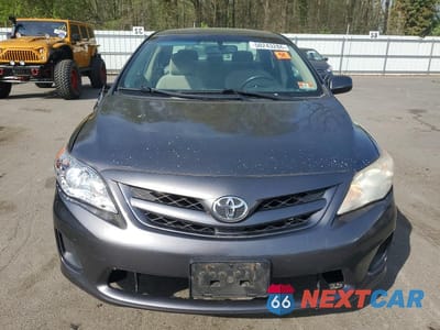 Piąte zdjęcie samochodu w środku: 2011 TOYOTA COROLLA LE VIN:JTDBU4EE3BJ097457 - miniatura