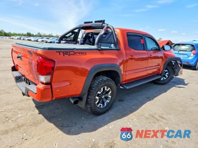 Trzecie zdjęcie samochodu z tyłu: 2016 TOYOTA TACOMA TRD OFF-ROAD VIN:5TFCZ5AN2GX008791 - miniatura