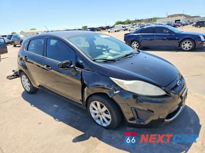 Czwarte zdjęcie samochodu z boku: 2011 FORD FIESTA SE VIN:3FADP4EJ9BM172300 - miniatura