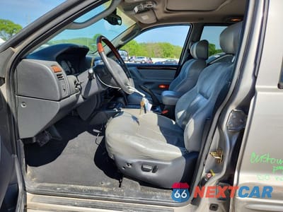 Zdjęcie 7 z 14 samochodu: 2002 JEEP GRAND CHEROKEE OVERLAND VIN:1J8GW68J12C183285 - miniatura