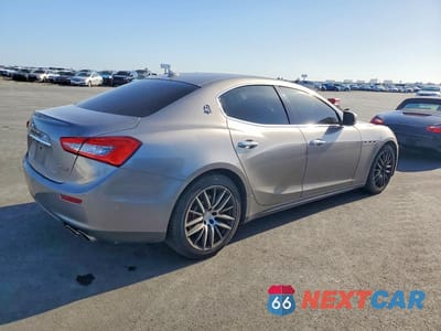 Trzecie zdjęcie samochodu z tyłu: 2016 MASERATI GHIBLI VIN:ZAM57XSA4G1175013 - miniatura