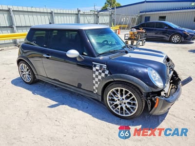 Czwarte zdjęcie samochodu z boku: 2006 MINI COOPER S VIN:WMWRE33536TN25334 - miniatura