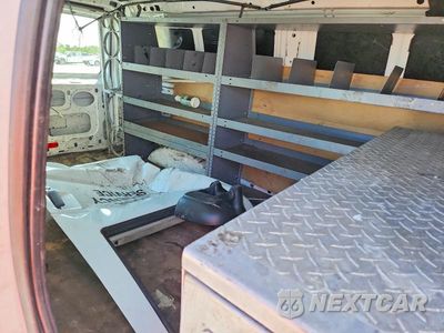 Zdjęcie 10 z 11 samochodu: 2014 FORD ECONOLINE E150 VAN VIN:1FTNE1EWXEDA59440 - miniatura