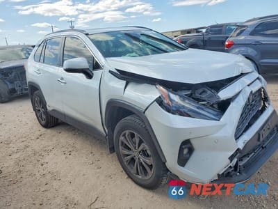 Czwarte zdjęcie samochodu z boku: 2023 TOYOTA RAV4 HYBRID LIMITED VIN:JTMD6RFV7PD094775 - miniatura