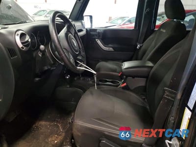 Zdjęcie 7 z 13 samochodu: 2017 JEEP WRANGLER UNLIMITED SAHARA VIN:1C4BJWEG8HL600273 - miniatura