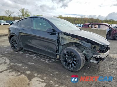 Czwarte zdjęcie samochodu z boku: 2021 TESLA MODEL Y VIN:5YJYGDEE2MF266346 - miniatura