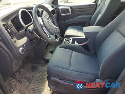 Zdjęcie 7 z 13 samochodu: 2006 HONDA RIDGELINE RTS VIN:2HJYK16446H003688 - miniatura
