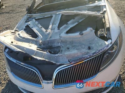 Zdjęcie 11 z 11 samochodu: 2013 LINCOLN MKS VIN:1LNHL9FT8DG612097 - miniatura